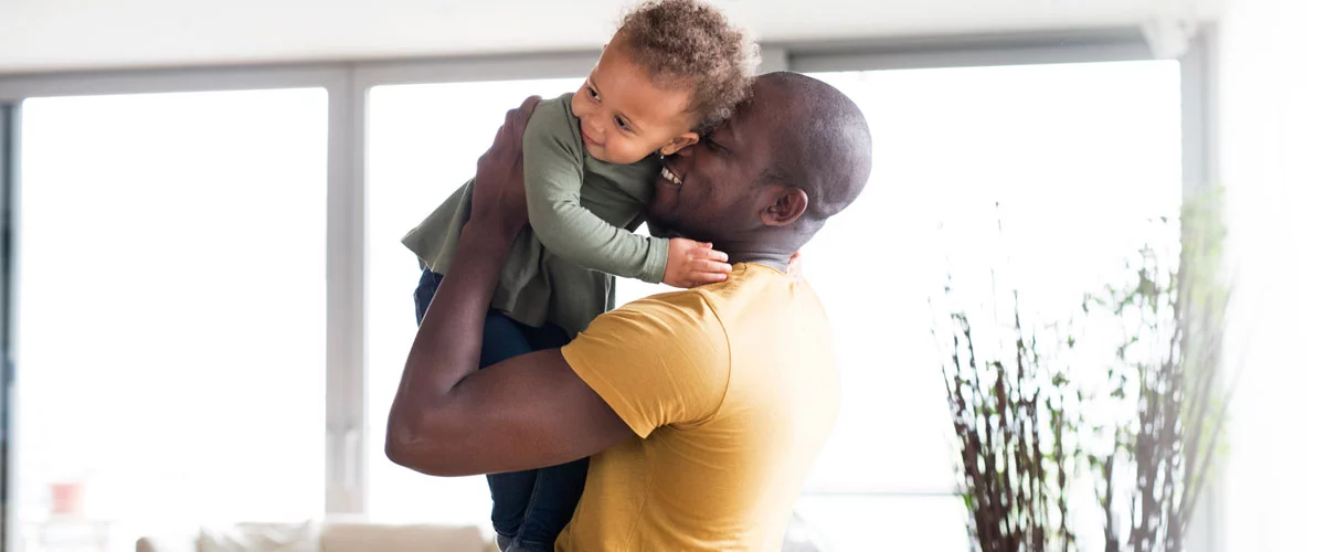 Dad playing with child